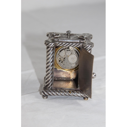 1122 - VICTORIAN BRIGHT-CUT SILVER CARRIAGE CLOCK WITH TWIST COLUMNS TO EACH CORNER - LONDON 1891 - GROSS W... 