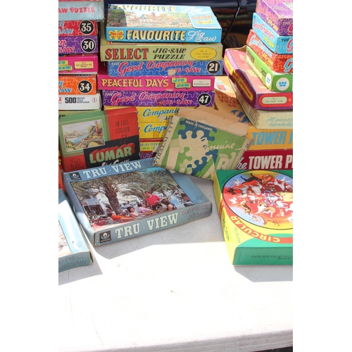 675 - LARGE QUANTITY OF VINTAGE JIGSAW PUZZLES