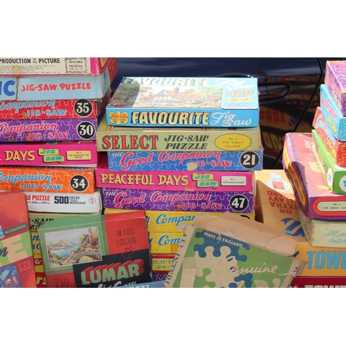 675 - LARGE QUANTITY OF VINTAGE JIGSAW PUZZLES