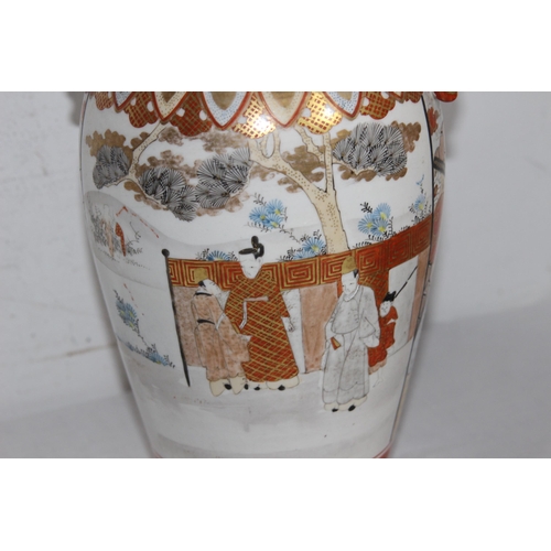 840 - TWO GRADUATED JAPANESE KUTANI VASES WITH PANELS DECORATED WITH BIRDS AND FIGURES 
32CM