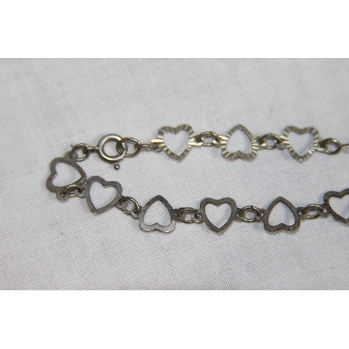 1000 - TWO SILVER BRACELETS, ONE IN HEART FORM