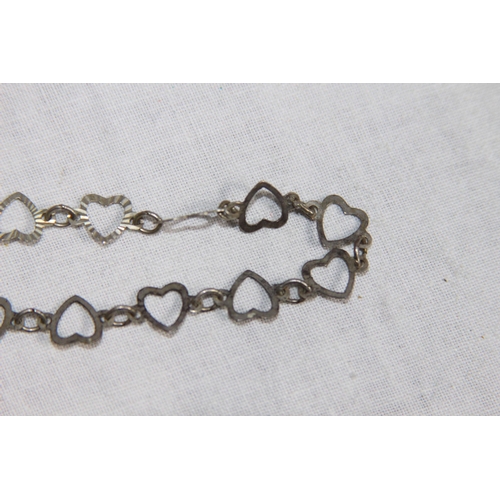 1000 - TWO SILVER BRACELETS, ONE IN HEART FORM