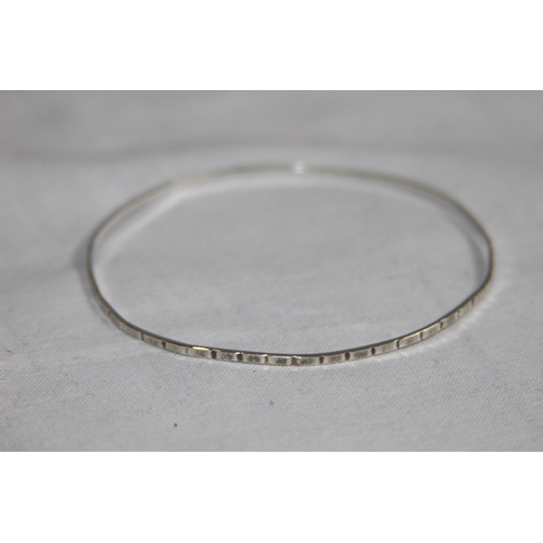 1009 - PAIR OF SILVER BRACELETS AND A BABY SILVER BRACELET