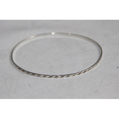 1009 - PAIR OF SILVER BRACELETS AND A BABY SILVER BRACELET