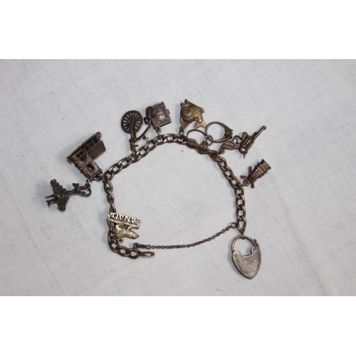 1011 - SILVER CHARM BRACELET - 39G