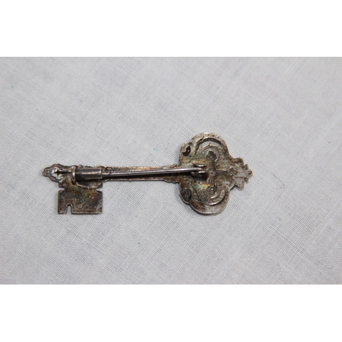 1020 - TWO FILIGREE SILVER BROOCHES AND A FRENCH KEY TO THE CITY, PARIS, WHITE METAL SILVER BROOCH