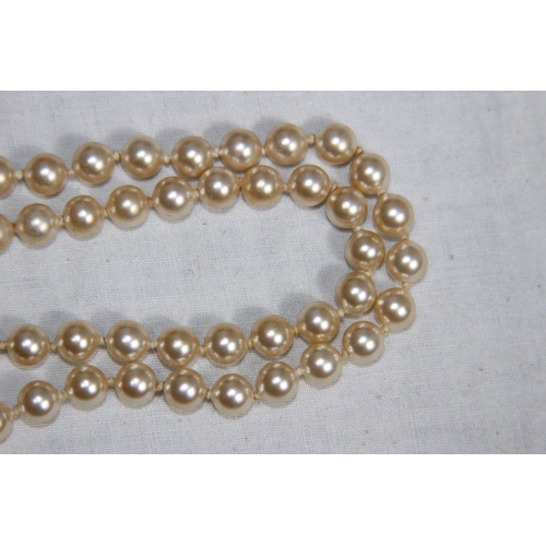 1028 - FANCY LINK SILVER CHAIN AND A SILVER CLASPED FAUX PEARL NECKLACE