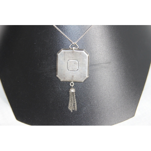 1032 - OCTAGONAL FORM SILVER LOCKET ON A SILVER CHAIN