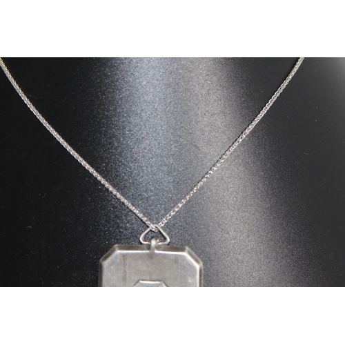 1032 - OCTAGONAL FORM SILVER LOCKET ON A SILVER CHAIN