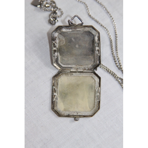 1032 - OCTAGONAL FORM SILVER LOCKET ON A SILVER CHAIN