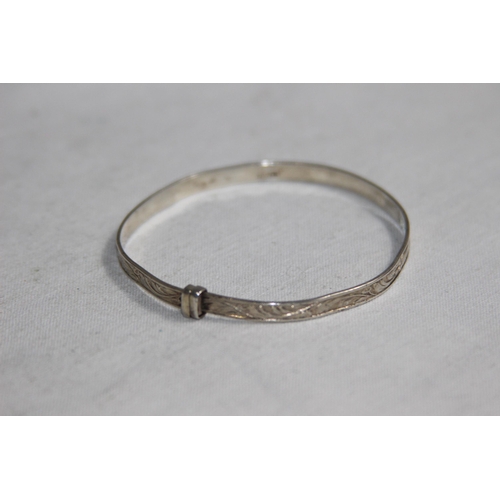 1033 - THREE EXPANDING SILVER BRACELETS IN VARIED DATES AND DESIGN