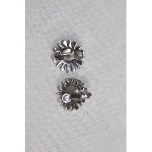 1034 - THREE PAIRS OF SILVER EARRINGS IN VARIED DESIGNS