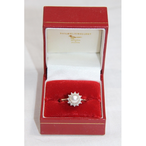 1163 - 9CT GOLD PEARL WITH DIAMOND SURROUND RING - 2.63G - SIZE N