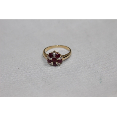 1166 - RUBY AND DIAMOND SET 9CT GOLD RING - 2.72G - SIZE L