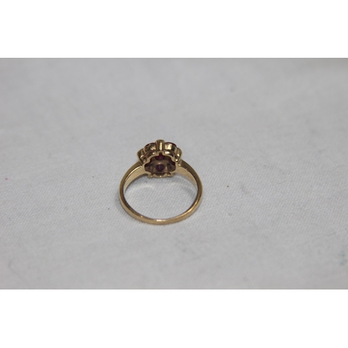 1166 - RUBY AND DIAMOND SET 9CT GOLD RING - 2.72G - SIZE L