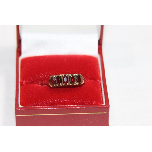 1178 - GARNET SET 9CT GOLD RING - 2.71G - SIZE N