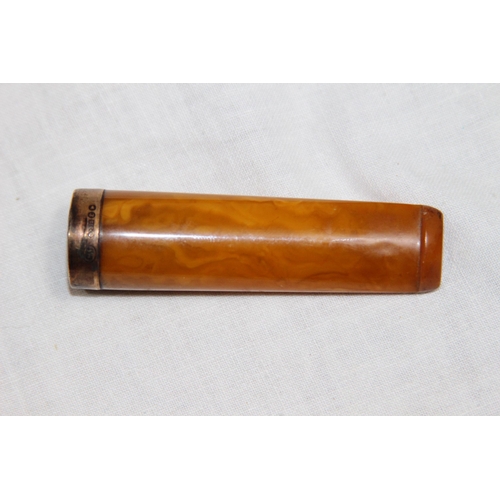 1180 - GEORGE V 9CT GOLD MOUNTED AMBER LARGE CHEROOT OR CIGAR HOLDER