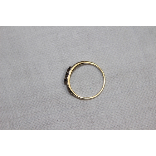 1181 - SAPPHIRE AND C2 SET 9CT GOLD RING - 2.32G - SIZE M