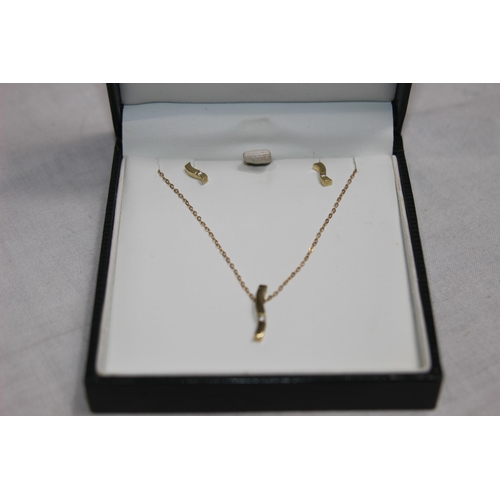 1218 - 9CT GOLD DIAMOND PENDANT NECKLACE AND EARRING SET SUITE CASED