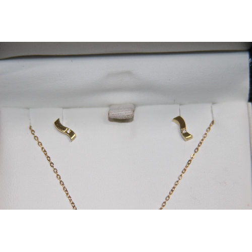 1218 - 9CT GOLD DIAMOND PENDANT NECKLACE AND EARRING SET SUITE CASED