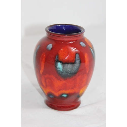 303 - POOLE VOLCANO BUD VASE 
10CM