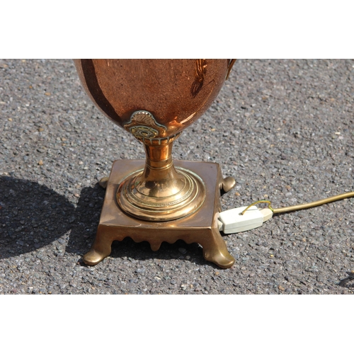 217 - INTERESTING BRASS AND COPPER LAMP
57CM