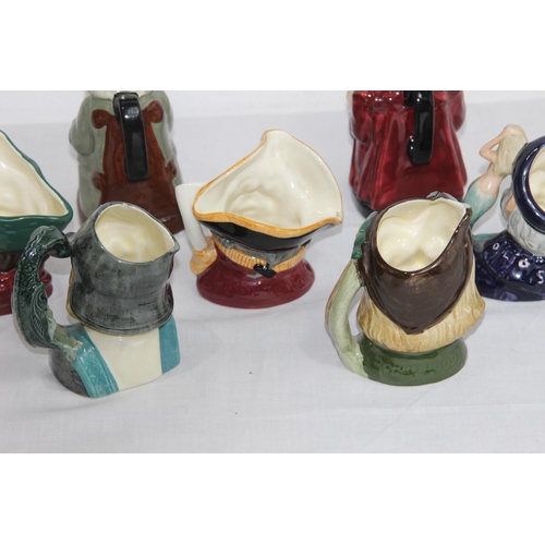 389 - QUANTITY OF ROYAL DOULTON  TOBY JUGS 
15CM