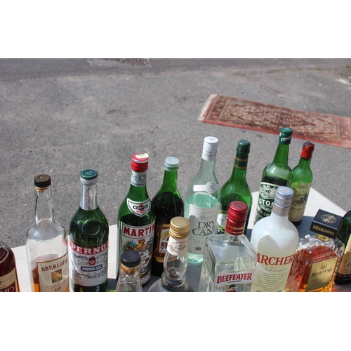 801 - LARGE QUANTITY OF OPENED ALCOHOL