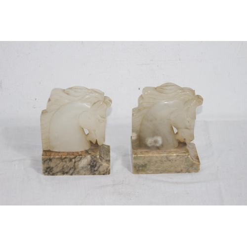 319 - PAIR OF ONYX HORSE HEADED BOOK ENDS ON MARBLE BASE 
16.5CM