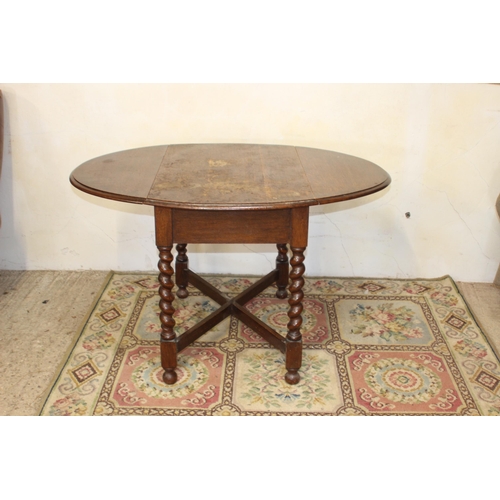 53 - BARLEY TWIST TABLE AND TWO WHEEL BACK CHAIRS 
90 X 71 X 120