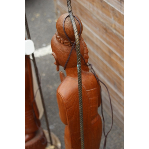 232 - VINTAGE LARGE PAIR OF FIGURAL THAI TEAK LAMPS ON A MARBLE BASE 
96CM