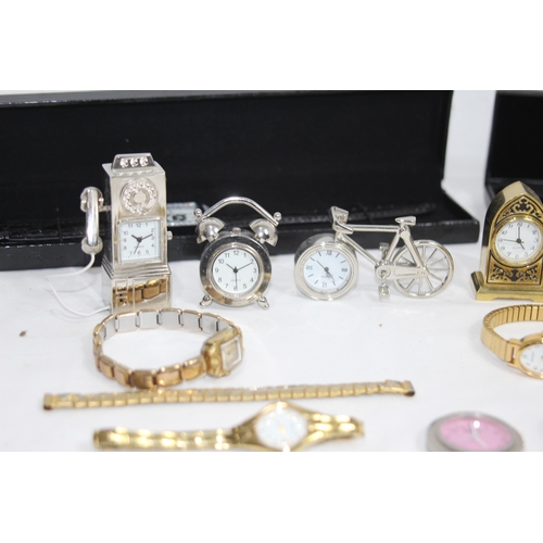 879 - QUANTITY OF WATCHES AND NOVELTY CLOCKS