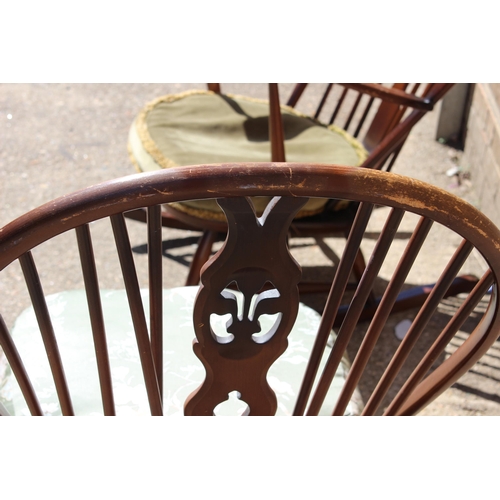 106 - 2 X RETRO ERCOL ARMCHAIRS - ONE OS A ROCKER - ONE A/F ARMS HAVE BEEN REMOVED 
70 X 80 X 94CM