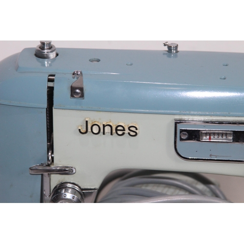 557 - VINTAGE JONES SEWING MACHINE