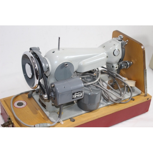 558 - VINTAGE JONES SEWING MACHINE