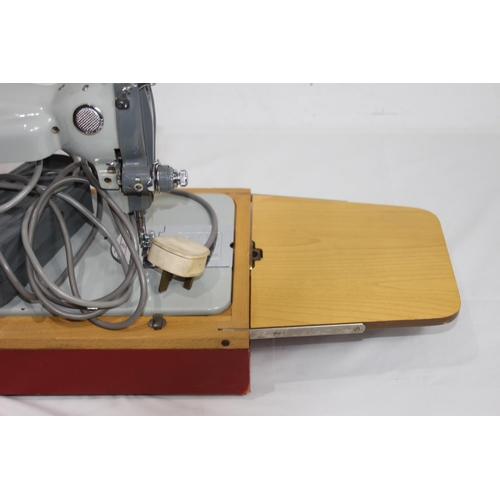 558 - VINTAGE JONES SEWING MACHINE