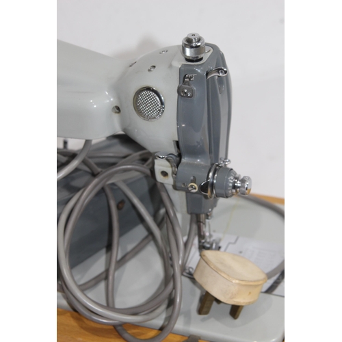 558 - VINTAGE JONES SEWING MACHINE