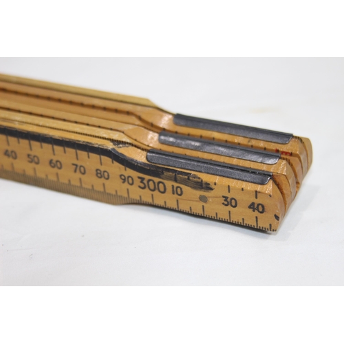 587 - VINTAGE RABONE CHESTERMAN EXTENDABLE WOODEN TAPE MEASURE PLUS ONE OTHER