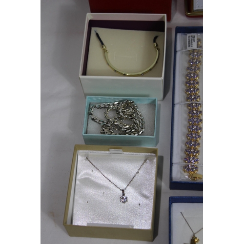 605 - QUANTITY OF BOXED COSTUME JEWELLERY