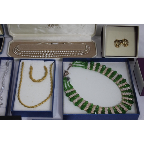 605 - QUANTITY OF BOXED COSTUME JEWELLERY