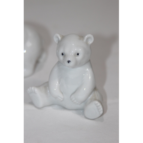 838 - 4 X PORCELIAN POLAR BEAR CUB FIGURES
9CM