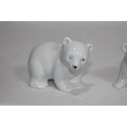 838 - 4 X PORCELIAN POLAR BEAR CUB FIGURES
9CM