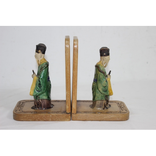 445 - PAIR OF ORIENTAL BOOKENDS 
19CM