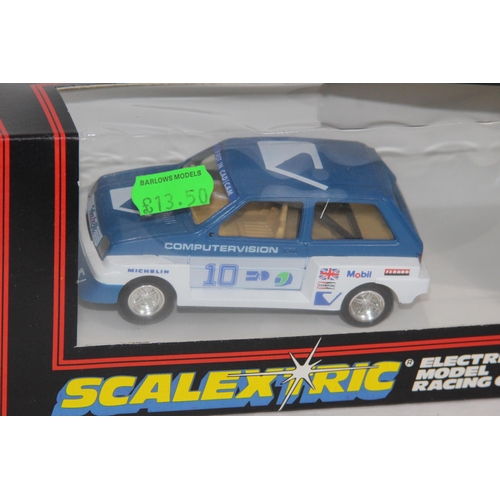 712 - 3 X BOXED VINTAGE SCALEXTRIC CARS