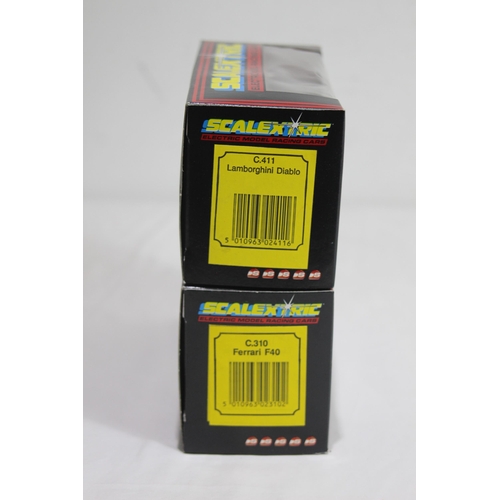 720 - 2 X BOXED VINTAGE SCALEXTRIC CARS