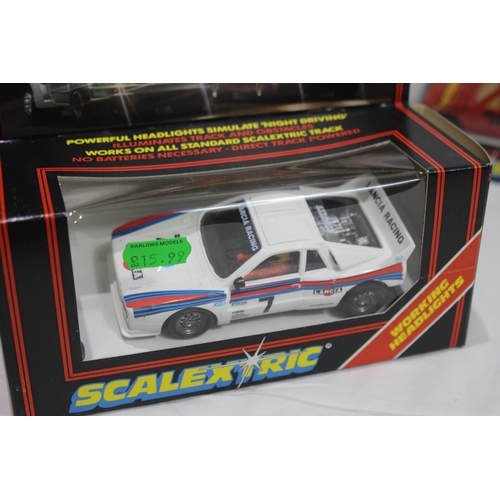 724 - 2 X BOXED VINTAGE SCALEXTRIC CARS WITH LIGHTS