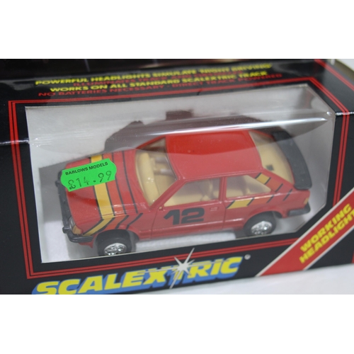 724 - 2 X BOXED VINTAGE SCALEXTRIC CARS WITH LIGHTS