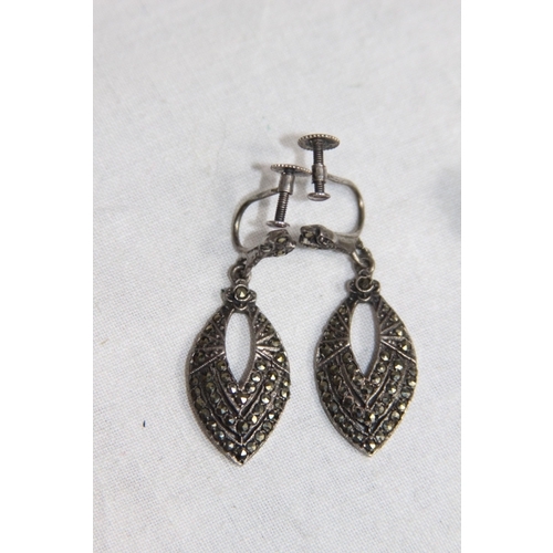 1034 - THREE PAIRS OF SILVER EARRINGS IN VARIED DESIGNS