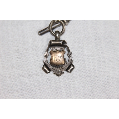 1085 - GRADUATED SILVER WATCH CHARM WITH A SILVER AND GOLD FOB - 26CM