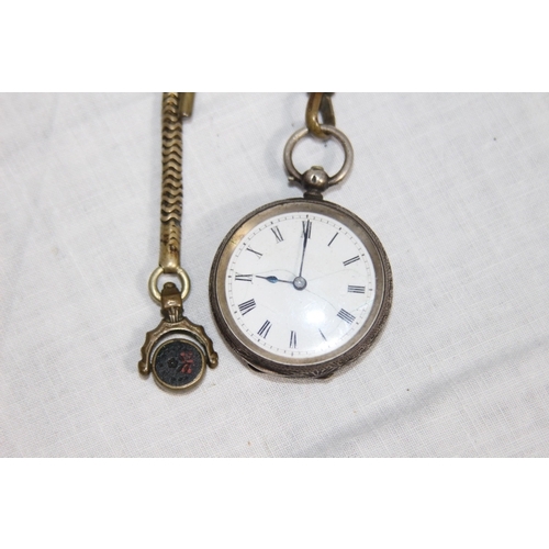 1097 - SWISS SILVER FOB WATCH ON A METAL CHAIN WITH SWIZZLE FOB